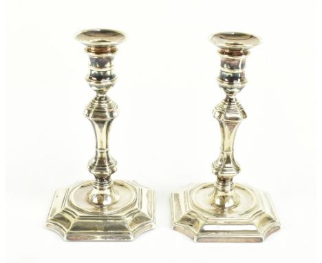 HAWKESWORTH, ERE &amp; CO LTD; a pair of Victorian hallmarked silver taper sticks, with detachable sconces, Sheffield 1893, h