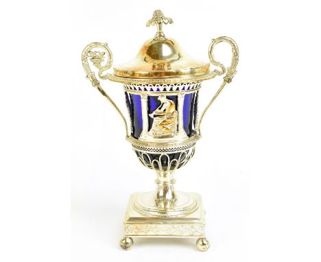 D GARREAU; a late 18th century French Empire silver twin handled sugar basket with blue liner and cover featuring pierced and