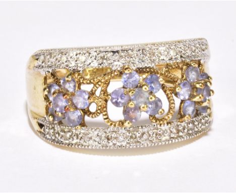 A 9ct yellow gold, amethyst and diamond dress ring with openwork floral detail, size Q, approx 3.3g.