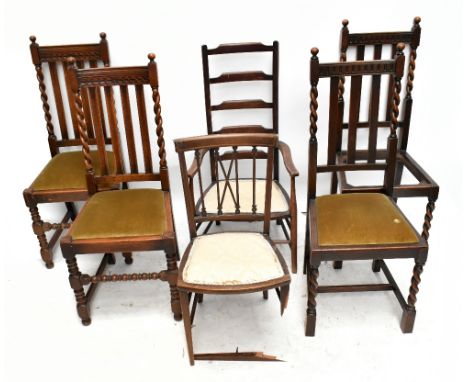 Two pairs of oak barley twist dining chairs, a ladder back elbow chair and an Edwardian mahogany side chair (af) (6).Addition