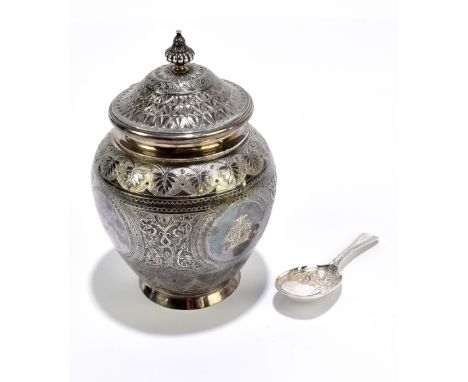 EDWARD, JOHN & WILLIAM BARNARD; a Victorian hallmarked silver tea caddy and spoon, with cast scrolling geometric and floral d