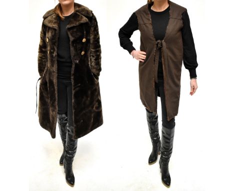TED LAPIDUS; a vintage 'Nouvelle Haute Couture' long brown faux fur double breasted coat, fully lined, edged with brown soft 