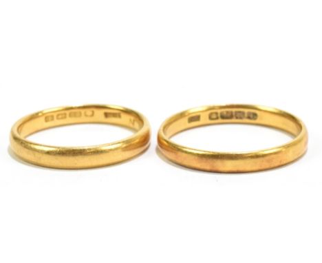 Two 22ct yellow gold wedding bands, one approx L/M, the second R, approx 6.7g.Additional InformationEach misshapen, wear.