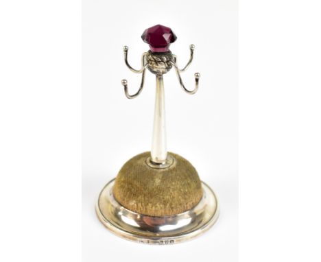 WILLIAM VALE &amp; SONS; a George V hallmarked silver mounted four branch ring tree on loaded circular base set with amethyst