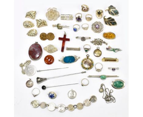 An interesting collection of silver and white metal jewellery, predominantly brooches, some with a Celtic design, also polish