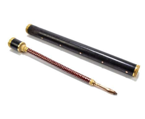 A late 19th century Continental pencil with yellow metal mounts, indistinctly marked, possibly French, in stained wooden case