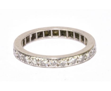 A white metal diamond set full eternity ring, size K 1/2, approx 3.1g.Additional InformationThe width of the band is approx 2