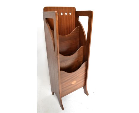 An Edwardian inlaid mahogany free standing three sectioned magazine rack with pierced sides and back panel, height 99cm, widt