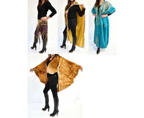 A vintage gold velour gold sleeved blouse/jacket, a gold sequin and purple silk belly dancing skirt, a gold cape, and a long 