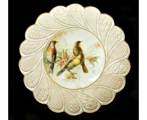 MEISSEN; an early 20th century hand painted plate, the central panel&nbsp;depicting exotic birds inside a scalloped edge bord