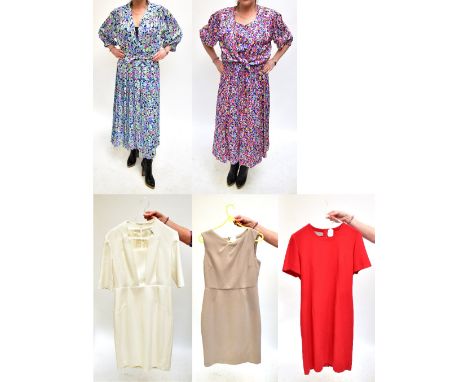 KANGA COLLECTION BY DALE TYRON LONDON; two multi-coloured vintage long sleeved dresses with elasticated waist and cuffs, and 