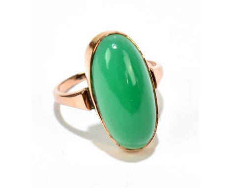 A 9ct yellow gold ring set with oval green jade cabochon, size L 1/2, approx 2.8g.Additional InformationThe stone is jade but
