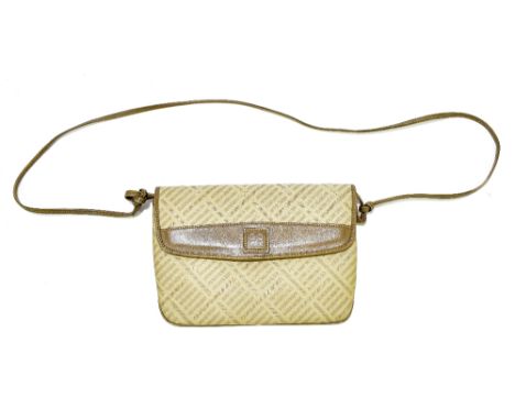 GIVENCHY; a soft tan nappa leather and monogrammed cloth shoulder bag with Givenchy logo, long leather shoulder strap, stud f