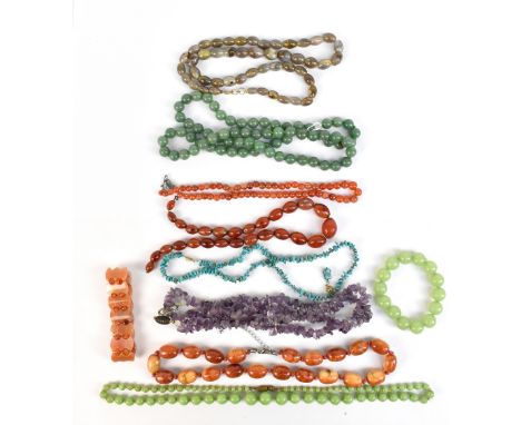 A group of bead necklaces including carnelian, turquoise, rough cut amethyst, etc.