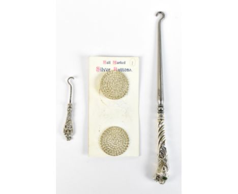 CHARLES HORNER; a pair of Victorian hallmarked silver buttons, Chester 1895, diameter 2.7cm, also a small button hook with fi