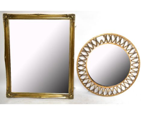 A modern gilt framed wall mirror with bevelled glass, 105 x 128cm, and a&nbsp;decorative circular example inset with amber co