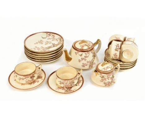 A Japanese Satsuma twenty piece tea service, each decorated with stylised birds and foliate, with character mark to base.Addi