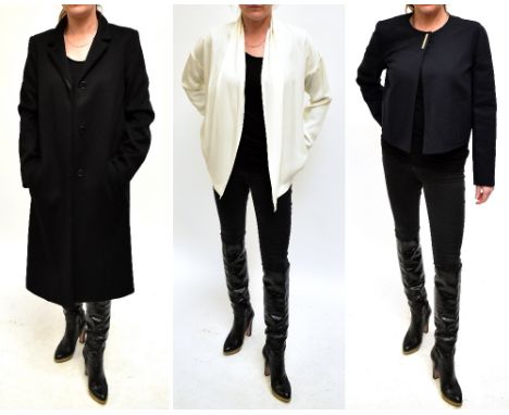 SALVATORE FERRAGAMO; a long black 100% wool fully lined long sleeved coat with four front buttons, two front pockets and smal