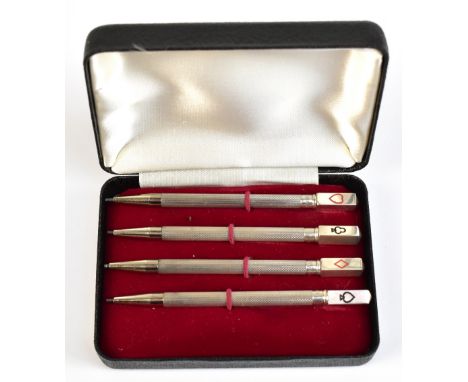 A cased set of sterling silver bridge pencils with enamelled terminals for the four different suits, length of each 8.5cm.Add