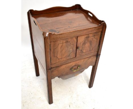 A 19th century mahogany bedside cupboard converted from a commode with&nbsp;green leather inset top panel above two panel doo