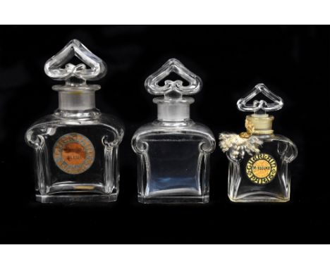 BACCARAT; three clear glass 'Guerlain' perfume bottles including a cased example, two complete with original labels, height o