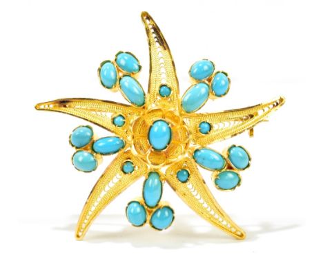 A yellow metal turquoise set brooch in the form of a starfish, diameter 6cm, approx 22.2g.Additional InformationThe turquoise