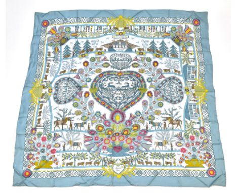 HERMES; a 100% silk light blue, gold and tan scarf 'D'ecoupages' designed by Anne Rosat, with Hermes Paris and tag, 90 x 90cm
