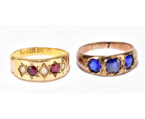 An Edwardian 15ct yellow gold garnet and seed pearl five stone ring, size K 1/2, approx 3.1g, and an unmarked yellow metal th