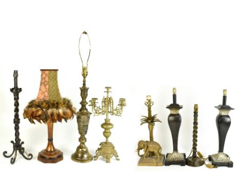 Eight&nbsp;decorative table lamps&nbsp;including a brass example modelled as an elephant beside a palm tree,&nbsp;height 52cm