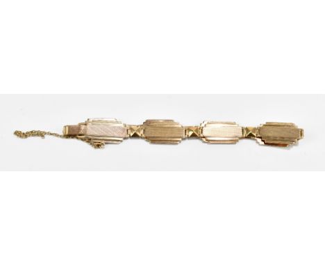 A 9ct yellow textured gold bracelet, with engine turned decoration, approx 15.9g.Additional InformationThe safety chain has b