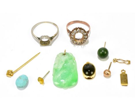 A small group of jewellery including a white metal ring mount and a yellow metal ring mount, a jade pendant, small pendant wi