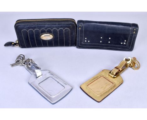 CHLOE; a large soft black leather purse wallet with Chloe logo, gold tone hardware and zip top opening, 19 x 10 x 2cm, a blac