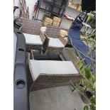 Brown rattan outdoor 4 piece garden seating set comprising 2 seater sofa, 2 armchairs and glass
