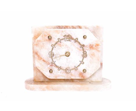 ART DECO ONYX MANTEL CLOCK
with gilt Arabic and baton numeral chapter ring on a shaped rectangular outset onyx slab, with Smi