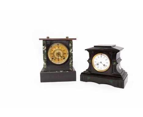 TWO 19TH CENTURY ARCHITECTURAL BLACK SLATE MANTEL CLOCKS
to include a malachite inlaid example, the enamel dial with Roman nu