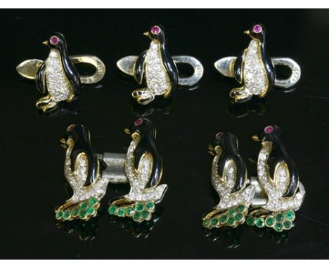 A Continental two colour gold, diamond, emerald and enamel novelty penguin cufflink and dressing stud set, each cufflink comp