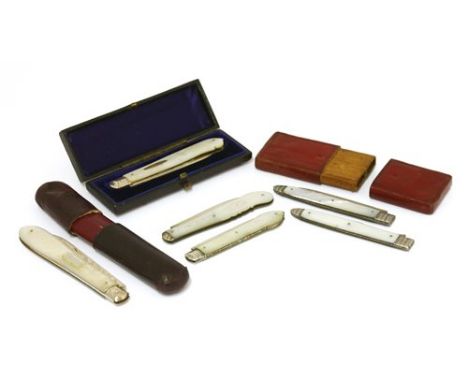 A collection of silver and mother-of-pearl fruit knives, to include a Georgian red leather-cased knife and fork example, of s