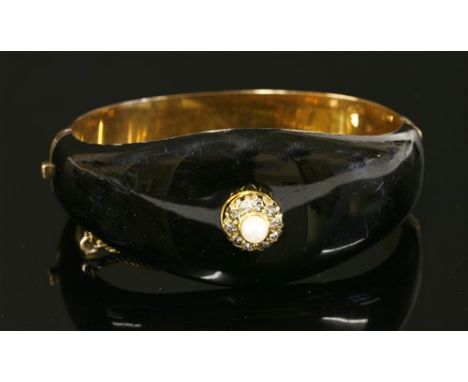 A Victorian gold, pearl, diamond and enamel memorial hinged bangle, a pearl and old Swiss cut diamond circular cluster mounte