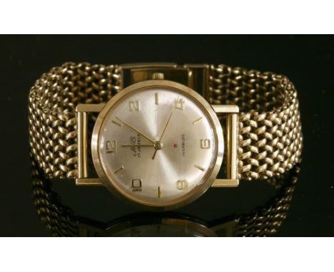 A gentlemen's 9ct gold Uno Incabloc mechanical watch, with a later 9ct gold Milanese bracelet, both c.1960. The case 33mm dia