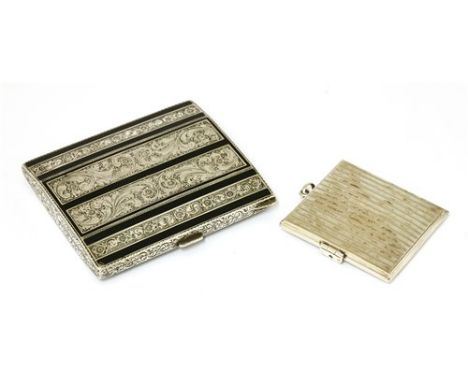 A Continental silver and black enamel cigarette case , silver engraved panels between plaques of black enamel, engraved throu