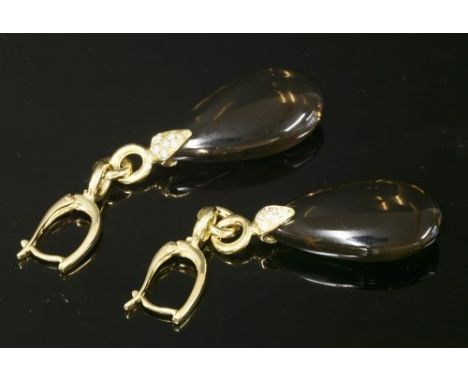 A pair of Italian smokey quartz and diamond drop earrings, with a smokey quartz pippin set to an arrow head cap, pavé set wit