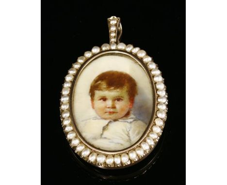 An Edwardian gold and split pearl set painted miniature portrait of a young child, c.1910, the glazed oval portrait with a sp