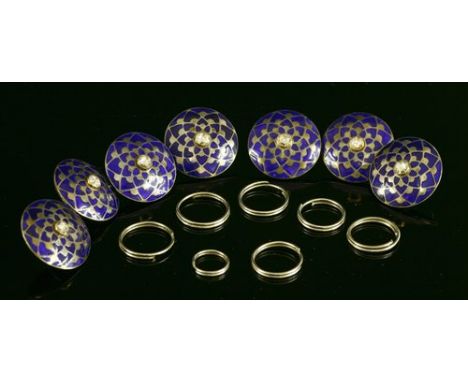 A set of seven silver, diamond and enamel dress buttons, a rose cut diamond, rub set to the centre, with radiating petals, de