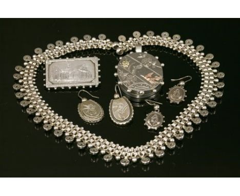 A Victorian sterling silver collar, with two rows of reeded belcher links, with applied lozenge tops and graduated outer bead