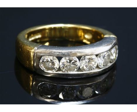 An 18ct gold diamond set half hoop ring, by Fred E Ullman, with five brilliant cut diamonds, channel set to a white head, wit