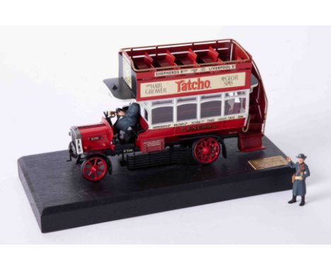 A Bassett Lowke precision scale white metal model of a London Bus, on stand, length 16cm, 36/2000 with certificate.