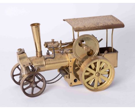 A brass model of a steam traction engine, length 30cm.