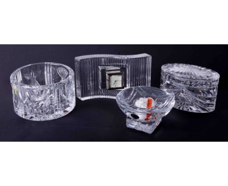 A modern Waterford Crystal wavelength clock, Champagne bottle coaster, overture oval box and candle stand, all boxed (4).