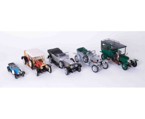 Franklin Mint five scale models comprising four Rolls Royce Silver Ghosts and a smaller model with three boxes, 1907 silver g