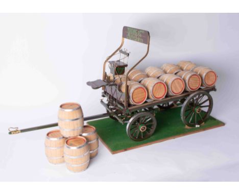A large scale model of a Brewery Wagon, thirteen barrels some marked 'Young &amp; Co Brewery Limited, London', approx. length